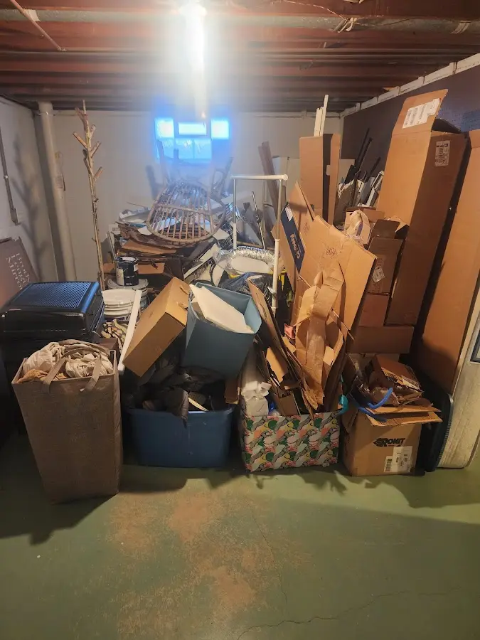 Roll-off dumpster container at job site for 2 Yard Dumpster Rental in Ringgold